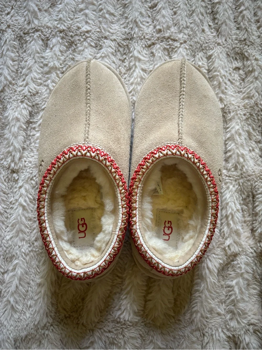 UGG Kids Tan Shearling Slip-On Slippers with Red Trim
